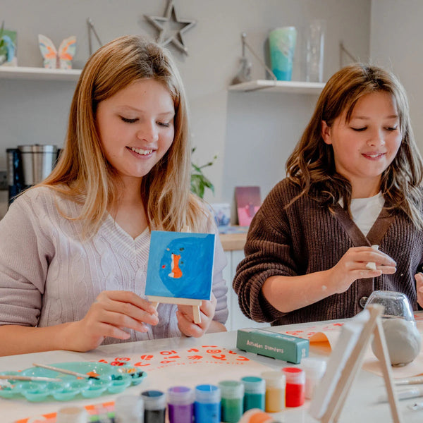 Two young kids enjoying their Sculpd kids canvas kit