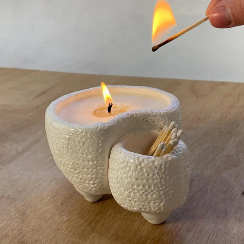 Halloween-themed candle and match holder with Sculpd Candle Making Kit